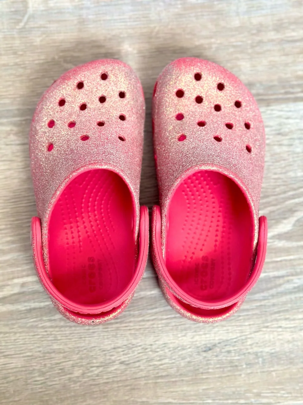 CROCS Kids Sparkle Clogs in Hot Pink